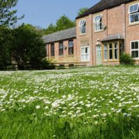 large grass garden area in front of Cote Ghyll Mill