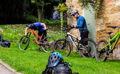 cyclists preparing their bikes at Cote Ghyll MIll
